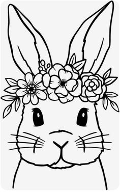 a rabbit with flowers on its head