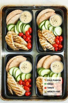 four trays filled with chicken, cucumber and tomato slices on top of each other