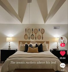 there is a bed with tennis rackets on the wall above it and an instagram