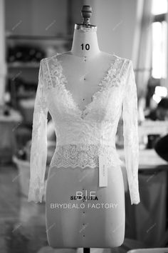 This designer V-neck bridal bolero composed of see-through long sleeve lace jacket with spaghetti straps sweetheart neck crepe crop top wedding separate underneath. An elegant wedding top could complement all styled bridal skirt. shown color light ivory bra support yes boning yes closure lace top+side zipper, bustier+lace up lining partially lined Bridal Separates Tops, Bolero Wedding, Bridal Bolero, Bridal Skirts, Bridal Tops, Bridal Separates, Wedding Top, Lace Jacket, Support Bras