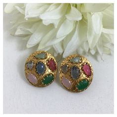 *PRODUCT DETAIL* *Material: Brass *Plating: Gold Plated *Stone: Semi Precious Gemstones *DIMENSIONS * *Weight: 8 gm Each *ABOUT PRODUCT* *Beautiful Designer High Quality Gemstone Studs. *Style Tip : Exclusive Multi Colored Stud Earrings for your Daily/Evening Outfit. *DISCLAIMER* *Product & color may slightly vary due to photographic lighting sources or your screen settings. Indian Gemstone Earrings, Indian Earrings Traditional Studs, Jaipur Jewelry Aurus, Gold Studs Earrings Indian Round Big, Stone Studs Earrings Gold Indian, Changing Stone Earrings Gold, Elegant Multicolor Meenakari Danglers, Traditional Clip-on Earrings For Festive Occasions, Multicolor Round Temple Jewelry Earrings