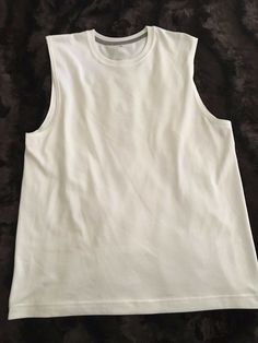 This a Roundtree and Yorke Performance Tee sleeveless muscle tee shirt in white. It is new, without tags, NWOT. 100% polyester. I combine shipping. White Stretch Cotton Tank Top, White Stretch Muscle Tee Casual Style, White Stretch Crew Neck Tank Top, White Stretch Muscle Tee With Crew Neck, White Sleeveless Muscle Tee For Summer, White Stretch Tank Vest, White Basic Workout Tank Top, White Basic Tank Top For Workout, White Crew Neck Tank Top For Workout