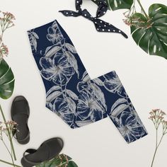 With a contemporary cottagecore vibe, these floral all-over print leggings will lift your mood whenever you wear them.  The print features an original graphite drawing of a white dipladenia flower, placed in a nice, large-scale pattern. Wear these workout tights at the gym, or for running errands in style! Pair these high-rise yoga leggings with an oversized hoodie, t-shirt, or blazer - the possibilities are endless. For a day around the city, match them with one of my custom painted sneakers - Floral Print Leggings For Spring Loungewear, Fitted Floral Print Leggings For Loungewear, Casual Floral Print Leggings For Loungewear, Casual Floral Print Yoga Bottoms, Painted Sneakers, Workout Tights, Scale Pattern, High Waist Yoga Pants, Legging Sport