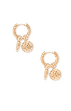 An eclectic trend with an iconic KS touch! Originally created with a wax seal of our logo through the traditional stamping process, the Dira Coin Huggie Earrings in Gold are for trend-setter's and those looking to add a bit of meaning to their collection.Dimensions0.6' OUTER DIAMETER, 0.46"L AND 0.43"L REMOVABLE CHARMSSeasonSUMMER 2021 Earrings In Gold, Huggie Earrings, Wax Seal, Wax Seals, Huggies Earrings, Trend Setter, Coin, Wax, Stamp