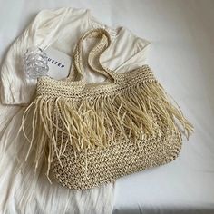 Elevate your summer style with the Andreia Long Tassel Straw Bag! Made from high-quality straw, this bag features a chic tassel design and spacious interior, perfect for carrying all your essentials. Whether you're headed to the beach or a brunch date, this bag will add a touch of bohemian luxury to any outfit. SIZE: W44cm x H38cm x D8cm / W17.3" x H15" x D3.2" Gender: WOMEN Item Type: Handbags & Shoulder Bags, Straw Bags Main Material: Straw Pattern Type: Knitting, Tassels Lining Material: POLY Crochet Animals Free Patterns, Brunch Date, Nylon Handbag, Rattan Bag, Straw Bags, Women's Handbags, Casual Tote, Types Of Bag, Shoulder Tote Bag