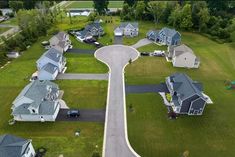 an aerial view of several houses and roads