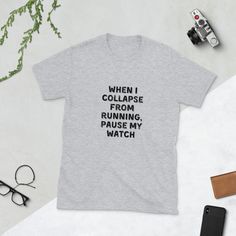 When I Collapse From Running, Pause My Watch/Graphic Tees/Funny T-Shirt/Unisex T-Shirt/Runners Top/Runners T-Shirt/Short-Sleeve Unisex Shirt. When I Collapse From Running, Pause My Watch. Funny Text Printed on Eco-Conscious, Environmentally Friendly Shopping Bag. You've now found the staple t-shirt of your wardrobe. It's made of 100% ring-spun cotton and is soft and comfy. The double stitching on the neckline and sleeves add more durability to what is sure to be a favorite!   Product description Breastfeeding Shirt, Papa Shirts, Boss Shirts, Funny Graphic Tees, The Double, Star Shirt, Dog Shirt, Funny T, Mom Shirts