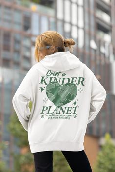 Create a kinder planet hoodie- Oversized Hoodie, Trendy Hoodie, Tumblr Hoodie, Aesthetic Hoodie, Perfect gift, Aesthetic Clothes Trendy Y2k  This unisex heavy blend hooded sweatshirt is relaxation itself. Made with a thick blend of cotton and polyester, it feels plush, soft and warm, a perfect choice for any cold day. In the front, the spacious kangaroo pocket adds daily practicality while the hood's drawstring is the same color as the base sweater for extra style points.\n.: 50% cotton, 50% pol Oversized Hooded Sweatshirt For School, Aesthetic Cotton Hooded Hoodie, Trendy Cotton Hoodie For School, Winter School Hoodie With Graphic Print, Winter Graphic Print Hoodie For School, Gift Aesthetic, Girls Hoodie, Clothes Trendy, Hoodie Aesthetic