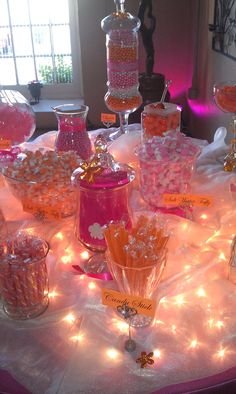 a table topped with lots of candy and candies