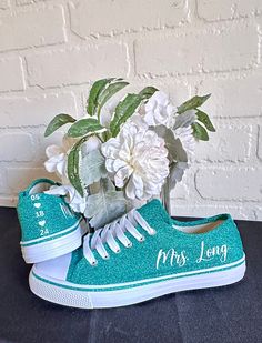 Personalized hand glittered unbranded canvas sneakers glittered in a gorgeous teal.  Made to order. Personalization is added in glitter to include name and date in your choice of black or white glitter writing. If desired, please include custom info in the order notes. If you normally wear a 1/2 size, we recommend you size up to the next whole size for a comfortable fit. Production time is approximately 1-2 weeks.   If you need your sneakers sooner, please select the 'Rush' option with your sele Sneakers For Wedding, Teal Wedding Shoes, Something Blue Shoes, Wedding Tennis Shoes, Bridal Party Bachelorette, White Wedding Shoes, Teal Wedding, Party Bachelorette, Glitter Sneakers