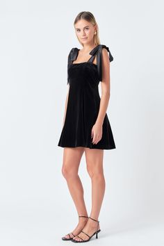 Stay fashionable and stylish with our Satin Tie Velvet Mini Dress! This chic dress features a luxe velvet material combined with a satin bow tie shoulder detail for an elegant look. It has a mini-length and a fit-and-flare silhouette for a flattering shape. Upgrade your wardrobe with this must-have mini dress and ensure all eyes are on you. Velvet material Satin bow tie shoulder Fit-and-flare silhouette Mini dress , shop the look and boost your style today! Velvet Satin shoulder bow tie Mini len Icon Clothing, Velvet Mini Dress, Dress Satin, Mini Velvet Dress, Velvet Material, Mini Dress Shop, Satin Bow, Chic Dress, Clothes Gift