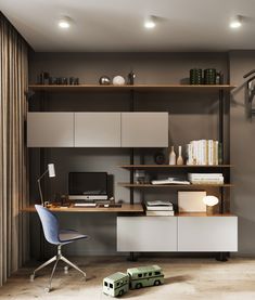 a room with a desk, shelves and a toy truck on the floor in front of it