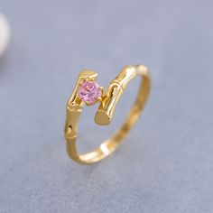 ★ 14K Solid Gold Bamboo Ring, 925 Sterling Silver Bamboo Ring, Bamboo Solitaire Ring, Stackable Ring, Cubic Zircon Pink Stone, Gift for Her★ ★ IMPORTANT SHIPPING & PRODUCTION DETAILS!! ★ RINGS: All rings are made to order at the selected size requested during checkout. I do not use a formula to determine ring sizing for wide bands (Unless noted within the listing) so if you select a size 6 and purchase 8-10 rings each ring will rest at the US ring size 6. All rings made at US ring sizes though y Bamboo Bangle, Bamboo Ring, Bamboo Tube Bracelets, Gold Bamboo Earrings, Gold Jewelry Outfits, Bamboo Earrings, Pink Stone, Wide Bands, Stackable Rings