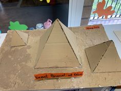 a cardboard model of the great pyramid of giza