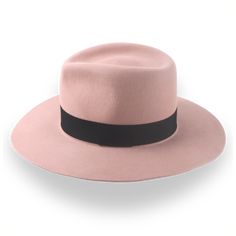 Description Materials Craftsmanship Hat Care Shipping Returns Product Description A Bold Wide-Brim Fedora Step into style with the Enigma, a dusty pink wide-brim fedora crafted from premium rabbit fur felt. Designed for both city and countryside adventures, this hat features a smooth finish and a 3 5/8" raw-edge flat brim for bold elegance. The teardrop crown adds a classic touch, while the durable rabbit fur felt ensures long-lasting wear. Delivered in a protective hat box with a complimentary Mens Felt Hats, Homburg Hat, Mens Dress Hats, Wide Brim Felt Hat, Hats For Big Heads, Outdoor Hut, Gambler Hat, Adventure Hat, The Raid