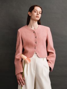 Editor's NotesThis is the winter version of the Peach-Shaped Neck Cropped Jacket  which was a popular item in the AVA MOLLI 23SS season. It features a soft curved fastening that falls from the neckline  creating a flawless silhouette when closed or open. The thick tweed fabric with silver buttons adds a touch of luxury and goes well with both skirts and jeans.- Available in 2 colors- Round neckline- Asymmetric front- Long sleeves- Cropped length- Button closure* Photos of the model fit may appear different in color due to the weather and lighting at the time of shooting  so please check the detail cut for the exact color.Measurements(in.)Size: S / M- Total length: 16.5 / 17.3 in.- Shoulders: 16.5 / 17.3 in. - Chest: 18.8 / 19.8 in. - Hem: 18.1 / 19 in.- Sleeve length: 23.6 / 24 in. - Sleev Classic Pink Wool Outerwear, Pink Fitted Wool Outerwear, Fitted Pink Wool Outerwear, Pink Long Sleeve Wool Blazer, Elegant Pink Winter Cardigan, Feminine Winter Workwear Cardigan, Classic Pink Winter Blazer, Chic Spring Wool Outerwear, Chic Pink Wool Outerwear