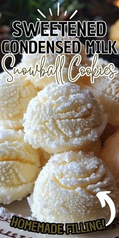 a white plate topped with cookies covered in powdered sugar next to pineapples