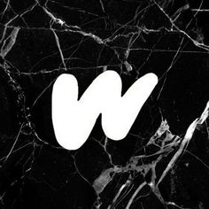 the letter w is made up of white letters on a black marble background with dark veining