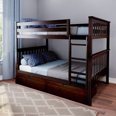 a bunk bed with two sets of drawers underneath it, in a room with hardwood floors and blue curtains