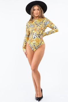 Description: Print bodysuit with long sleeves and mock neck, super Stretch Fabric Stretch bodysuit Long sleeve 95% polyester 5% spandex Hand wash cold Model is wearing a small Please see size chart for information on the fit Cheap Yellow Playwear Bodysuit, Cute Cartoon Print Bodysuit, Affordable Yellow Party Bodysuit, Fishnet Bodysuit, Casual Beach Wear, Body Suit Outfits, Yellow Print, Print Bodysuit, Shop Swimwear