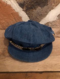 Vintage denim, newsboy style hat with side pocket in good condition Vintage Hats With Curved Brim In Medium Wash, Vintage Denim Blue Hat With Curved Brim, Vintage Curved Brim Denim Blue Hat, Vintage Denim Brimmed Hat, Vintage Denim Blue Denim Hat, Vintage Brimmed Denim Hat, Vintage Denim Cap, Vintage Denim Blue Cap, Newsboy Hat