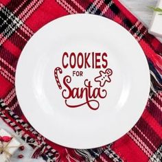 a white plate with the words cookies for santa on it