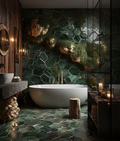 a bathroom that has a large white tub in the middle of it with green tiles on the walls