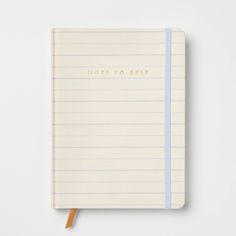 a notebook with the words, not to see written in gold and blue on it