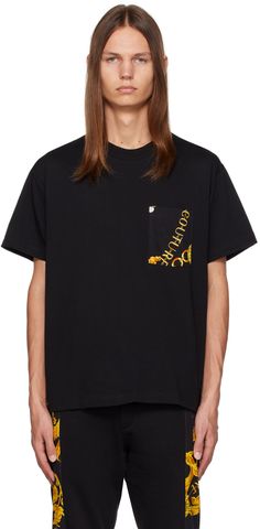 Cotton jersey T-shirt. Logo graphic pattern printed throughout. · Rib knit crewneck · Patch pocket Supplier color: Black/Gold Couture Outfits, Versace Jeans Couture, Versace Jeans, Black Chain, Logo Graphic, Graphic Patterns, Rib Knit, Versace, Print Patterns