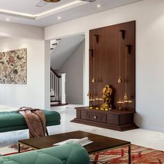 a living room filled with lots of furniture next to a bed in a white walled room