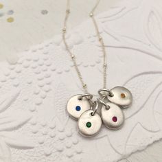 The sweetest design inspired by our love of beach pebbles. You will love the smooth organic feel of these little treasures. Keep your loves close by wearing a birthstone pebble for each one. A "treasure" you will cherish forever. These tiny treasures are handmade in our Dartmouth, MA studio and carefully set with your chosen birthstone. No two will look exactly alike. Each pebble measures approximately 10mm in diameter. Wear them simply on a chain or mix and match with other charms from our coll Pebble Necklace, Tiny Treasures, Aquamarine Stone, Big Love, Love Necklace, Personalized Necklace, Initial Necklace, Heart Charm, Stone Jewelry