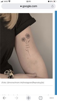 a woman with a flower tattoo on her arm