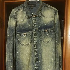 Rocawear Denim Shirt With Bleached Or Paint Spatter Look Dark Wash Washed Shirt For Spring, Acid Wash Tops With Pockets For Fall, Distressed Faded Denim Tops, Distressed Denim Tops In Faded Color, Faded Distressed Denim Tops, Distressed Button-up Shirt For Fall, Distressed Long Sleeve Shirt For Spring, Distressed Fitted Casual Shirt, Fitted Distressed Casual Shirt