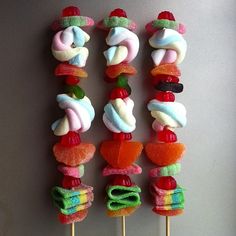 there are many colorful donuts on the stick