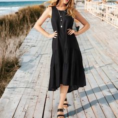 Bring A Little Bit Of The Island With You Anywhere You Go, With The Lena Gauze Midi Sundress. With Its Light-As-Air Feel And Breezy Cut, This Sundress Will Brighten Up Any Warm-Weather Wardrobe And Leave You Feeling On Cloud Nine. Armpit To Armpit 19 1/2” Length Front 45”, Back 52” Beach Vacation Travel Feminine Contemporary Black Sleeveless Midi Dress For Vacation, Black Midi Sleeveless Summer Dress, Black Midi Length Sleeveless Summer Dress, Black Sleeveless Midi Summer Dress, Black Sleeveless Midi Dress For Summer, Black Knee-length Beach Dress, Black Knee-length Dress For The Beach, Black Knee-length Midi Dress For Vacation, Black Knee-length Beach Midi Dress