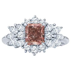 This beautiful ring features a spectacular 1.09 Carat Radiant cut Natural Fancy Intense Pink Natural Diamond certified as VS1 by the GIA. It is accented with a spread of marquise and round brilliant cut diamonds weighing approximately 0.86 carats in total weight all set in platinum. Pink Diamonds are extremely rare so when you own one, it is a true marvel of nature! Ring Size 6 GIA Report 14489058 Soul Contract, White Diamond Ring, Expensive Jewelry, Radiant Cut, Vintage Engagement, Beautiful Ring, Pink Diamond, Antique Rings, Round Brilliant Cut Diamond