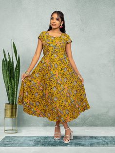 Yellow Knee Length Dress - Timeless Fusion Style | indian outfits usa | Indian Ethnic Wear | Indian Attire For Women | Indian Dresses From India  | Indian Attire For Women | Indian Dresses From India Spring Ceremonial Maxi Dress, Yellow Printed Maxi Dress, Sleeveless Dress With Printed Motifs For Spring, Casual Multicolor Festive Dress, Yellow Bohemian Midi Dress With Short Sleeves, Fitted Multicolor Midi Dress For Festive Occasions, Yellow Long Dress For Summer, Long Yellow Summer Dress, Casual V-neck Dress For Festive Occasions