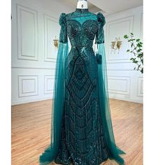 Emerald Green Luxury Dubai Evening Dresses with Cape Sleeves: Arabic Muslim Women's Wedding Party Gowns Luxury Floor-length Evening Dress For Festive Occasions, Luxury Festive Gown For Banquet, Luxury Green Gown For Banquet, Luxury Dress For Festive Banquet, Luxury Fitted Gown For Festive Occasions, Luxury Fitted Gown For Festive Season, Traditional Embellished Evening Dress, Fitted Luxury Gown For Festive Season, Traditional Fitted Festive Evening Dress