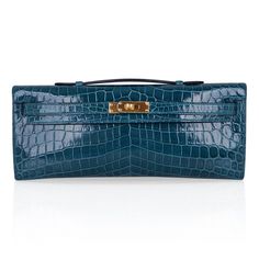 Guaranteed authentic crocodile Hermes Kelly Cut bag in timeless smokey Blue Colvert with lush gold hardware.Authentic Hermes Kelly Clutch in Blue Colvert is the perfect pop of soft colour for any outfit. Comes with sleeper, signature Hermes box and ribbon. NEW or NEVER WORNThe Hermes Kelly Cut crocodile price retains its value due to the rarity and high demand. Shop online at mightychic for Hermes crocodile skin bags and enjoy a world-class shopping experience. final sale BAG MEASURES:LENGTH 12. Hermes Crocodile, Hermes Evelyn Bag, Hermes Clutch, Hermes Twilly Scarf, Kelly Cut, Princess Grace Kelly, Dream Bags, Hermes Kelly Bag, Soft Colour