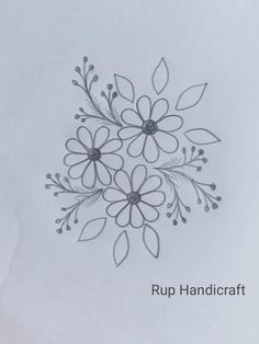 a drawing of some flowers on paper with the words rup handicraff