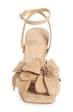 Dimensional flowers bloom atop an ankle-strap sandal crafted from soft suede and lifted by an elegantly curved heel. 2 1/2" heel Leather or synthetic upper/leather lining/synthetic sole Imported Sandals With Bows, Atomic Habits, Nude Wedges, Fashion Shoes Heels, Strappy Sandals Flat, Floral Sandals, Beautiful Heels, Flowers Bloom