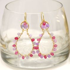 Delicate are our ELISA earrings, handcrafted with small jade gemstones in magenta and light purple tones wrapped in golden copper wire (wire description in materials). Purple and magenta tones add a delicate and cheerful touch to your formal or informal outfit. They are also perfect to give to bridesmaids or for that special holiday such as: Mother's Day, Birthday, Anniversary, Christmas or Valentine's Day. The accessories will reach your hands in a gift box and in a hard box so that it arrives Pink Briolette Earrings With Natural Stones, Pink Briolette Natural Stone Earrings, Pink Wire Wrapped Teardrop Earrings, Pink Teardrop Earrings With Natural Stones, Pink Teardrop Jewelry Beads For Crafting, Teardrop Pink Jewelry For Crafting, Pink Teardrop Beads For Jewelry Crafting, Pink Faceted Earrings For Jewelry Making, Pink Faceted Earrings For Gift