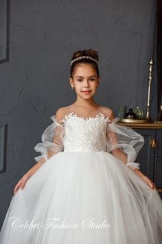 First Communion Gown With Tulle Skirt, Lace Ball Gown With Lace Bodice, Tulle First Communion Dress Ball Gown, Princess Style First Communion Ball Gown With Lace Bodice, Elegant Bridesmaid Tutu Dress With Lace Trim, White Princess Gown For Prom Season, First Communion Tulle Dress With Ruffles, White Princess Dress With Lace Trim For Bridesmaids, Princess Style Tulle Dress For Prom Season