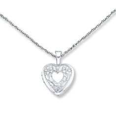 This lovely heart-shaped locket necklace for her is crafted of sterling silver with a floral design. The pendant sways from an 18-inch cable chain that fastens with a spring ring clasp. Sterling Silver Locket Necklace, Silver Locket Necklace, Kay Jewelry, Sterling Silver Locket, Heart Locket Necklace, Necklace For Her, Heart Shaped Necklace, Kay Jewelers, Silver Heart Necklace