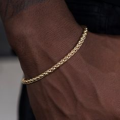 Introducing the Palm Chain Bracelet in Yellow Gold, the bolder 4mm version. This versatile 18k Yellow Gold bracelet features a braided rope design that will instantly level up your look. This piece is ideal for stacking and accessorizing any outfit- day or night. Pair it with the Palm Chain in 4mm for the perfect matching set! This product is guaranteed for life – GLD will repair or replace the item should you experience any defects in craftsmanship or breakage. Specifications - Width: 4mm - Len Classic Gold Bracelet With Rope Chain, Everyday Yellow Gold Rope Chain Bracelet, Classic Gold Rope Chain Bracelet, Classic 14k Gold Bracelet With Wheat Chain, Elegant Everyday Braided Bracelets, Everyday Yellow Gold Jubilee Braided Bracelet, Classic Rope Chain Bracelet, Classic 14k Gold Bracelet With Rope Chain, Modern Braided Jewelry For Everyday