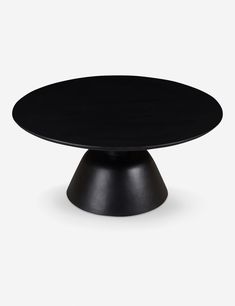 a black round table with an oval top on a white background, viewed from the front