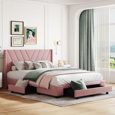 a bedroom with a pink bed and pictures on the wall above it in front of a window