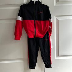 Nike 2 Piece Jogging Suit. Red And Black. Nwt Red Long Sleeve Sports Sets, Nike Sporty Winter Sets, Sporty Nike Winter Sets, Sporty Fitted Sets For Playwear, Sporty Red Long Sleeve Set, Nike Long Sleeve Sets For Winter, Nike Long Sleeve Sports Sets, Nike Long Sleeve Winter Sets, Red Sports Sets For Winter