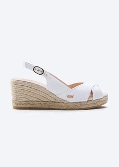 Llansa: limited edition medium wedges slingback espadrillesStunning medium wedge slingback espadrilles like these should be the foundation of any woman’s shoe collection. These are the perfect shoes for that summer party, featuring a cross open-toe and a striking 2.7” heel. With their casual cross open-toe, these comfortable wedge espadrilles will get you noticed. And they’re handmade in Spain. Naturally. Discover now your favorite limited edition colors before they go. Medium Wedges, Sandal Wedges, Sell Shoes, Comfortable Wedges, White Wedges, Wedge Espadrilles, Espadrille Sandals, Black Wedges, Slingback Heel