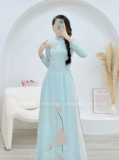 🌻Material: Lụa vân gỗ 🌻Stretchy level: 2/10 🌻 The measurement of this ao dai (long dress) is in Vietnamese size (American size tends to be bigger for the same size). Please LOOK AT THE SIZE CHART CAREFULLY BEFORE ORDERING. There might have some chalk writings on the fabric due to making process. These marks can be washed away easily. 🌻🌻No returns or exchanges Buyer can contact seller about any issues with an order. 🌸 Follow us Facebook/aodaiemily www.aodaiemily.com 💜 Thank you very much💜 Spring Floor-length Sets With Resham Embroidery, Blue Traditional Wear With Intricate Embroidery For Spring, Spring Blue Traditional Wear With Intricate Embroidery, Traditional Fitted Cotton Ao Dai, Fitted Embroidered Traditional Wear For Spring, Spring Traditional Wear Embroidered And Fitted, Spring Wedding Kurta With Embroidered Border, Long Sleeve Sets With Embroidered Hem For Spring, Elegant Fitted Sets With Embroidered Hem